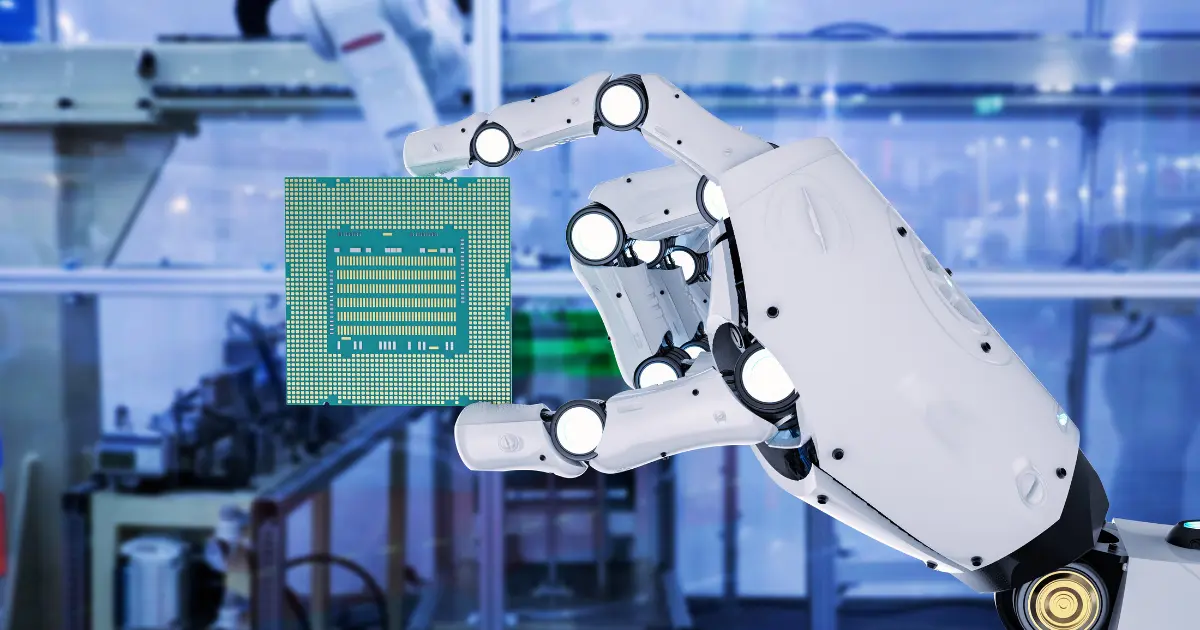 ASIC semiconductor chip held by a robotic arm in a manufacturing facility